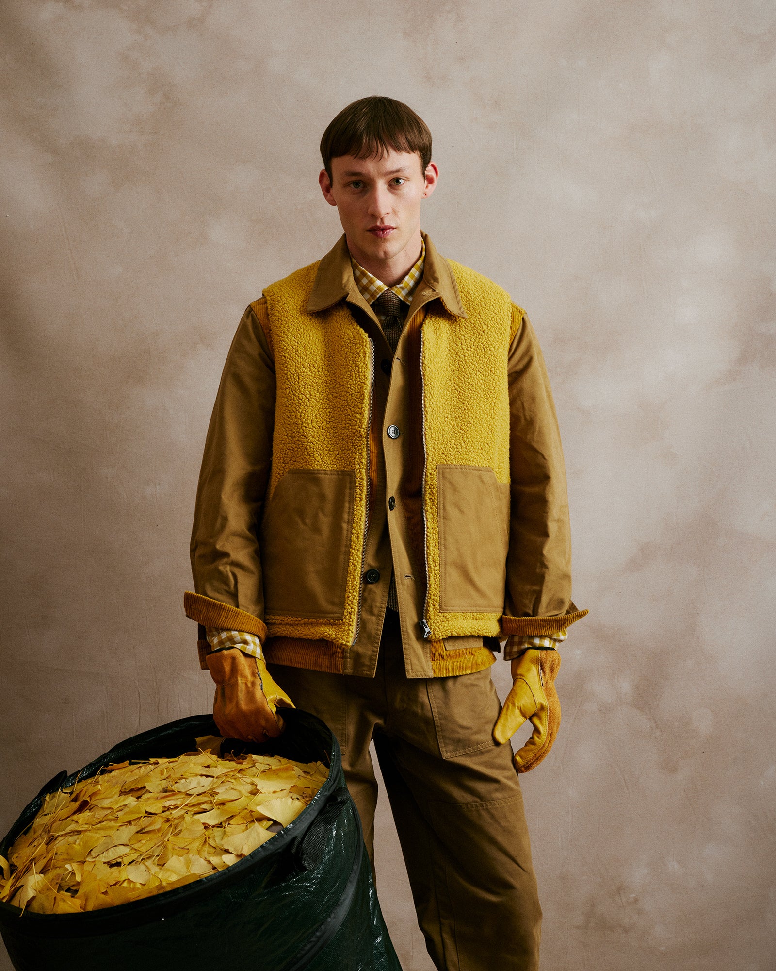 Rovi Lucca FW24 Orto Botanico Padded Garden Vest in khaki cotton with gold wool-blend panels.