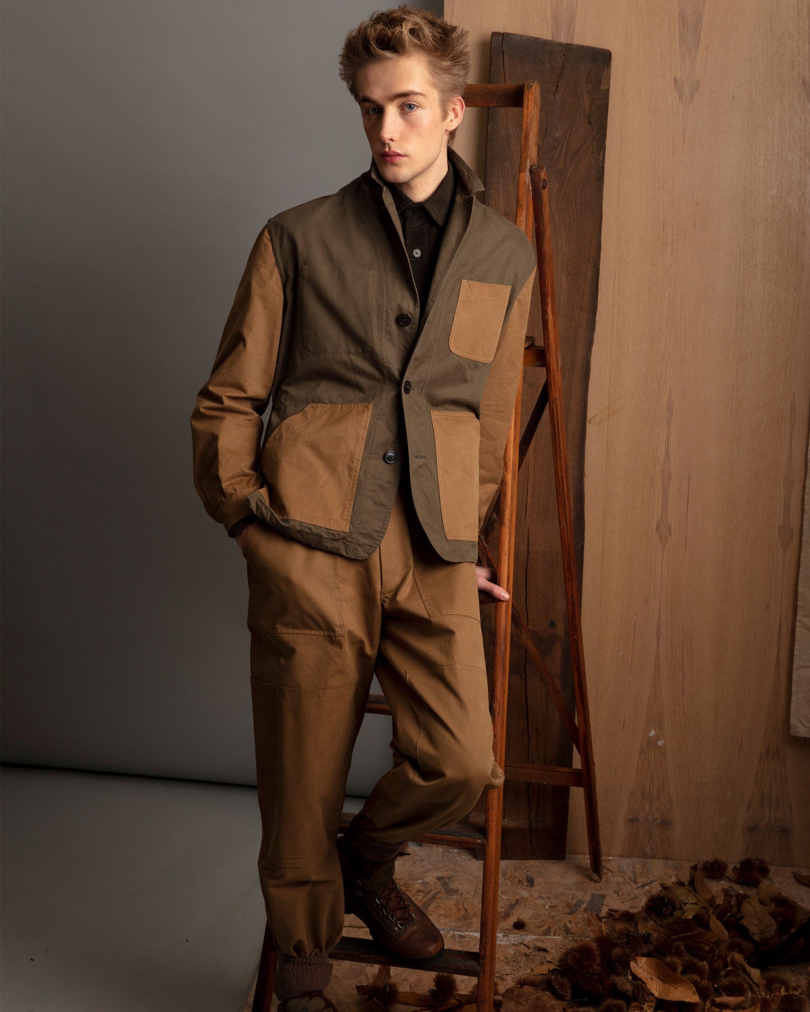 Full-length view of Patch Garden Blazer in lovat green, drab, and deep brown cotton twill, showing relaxed fit, drawstring waist, and utility pockets.